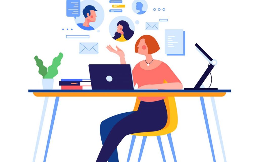 Woman at desk with laptop and icons.