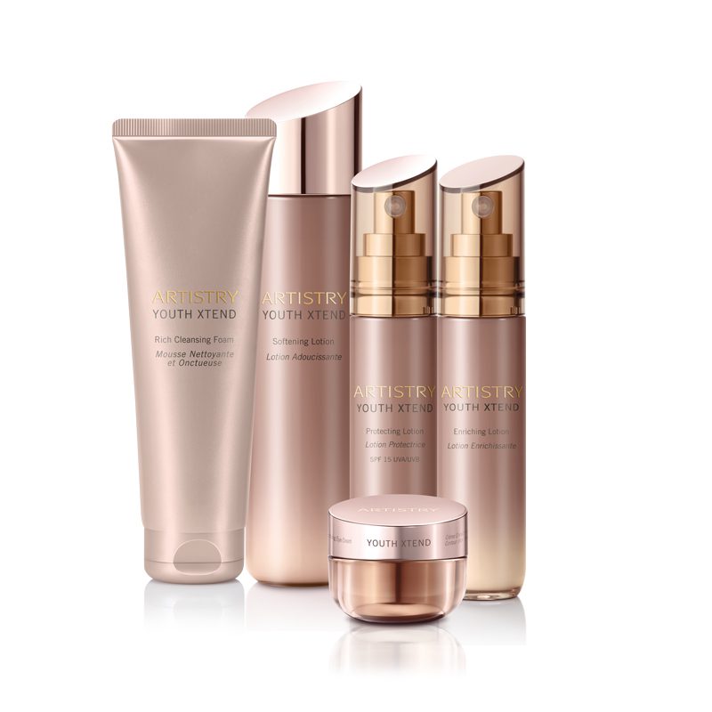 Skincare products with rose gold packaging.