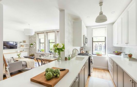 Bright modern kitchen with white cabinets.