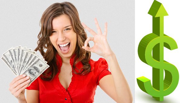 Woman holding money, making OK sign.