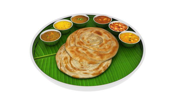 Parotta and curries served on banana leaf.
